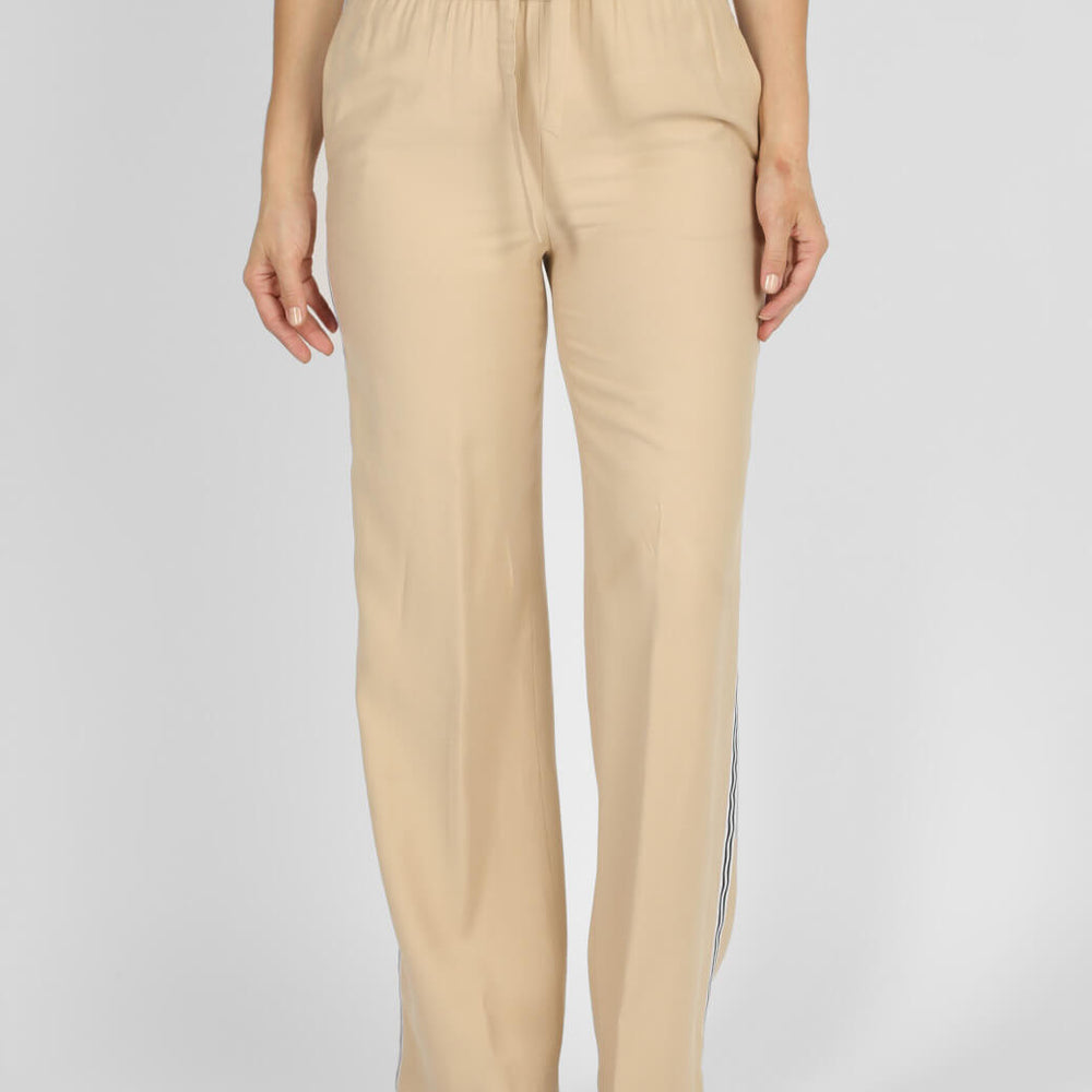 
                      
                        Pantalón beige Libia
                      
                    