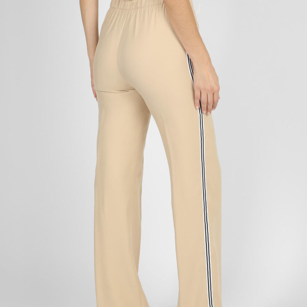 
                      
                        Pantalón beige Libia
                      
                    