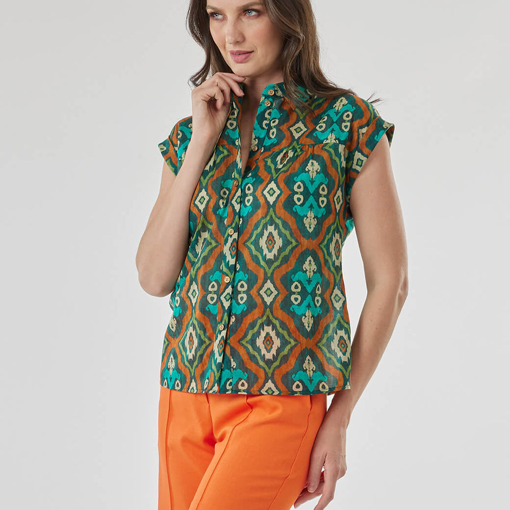 
                      
                        Blusa verde Kalani
                      
                    