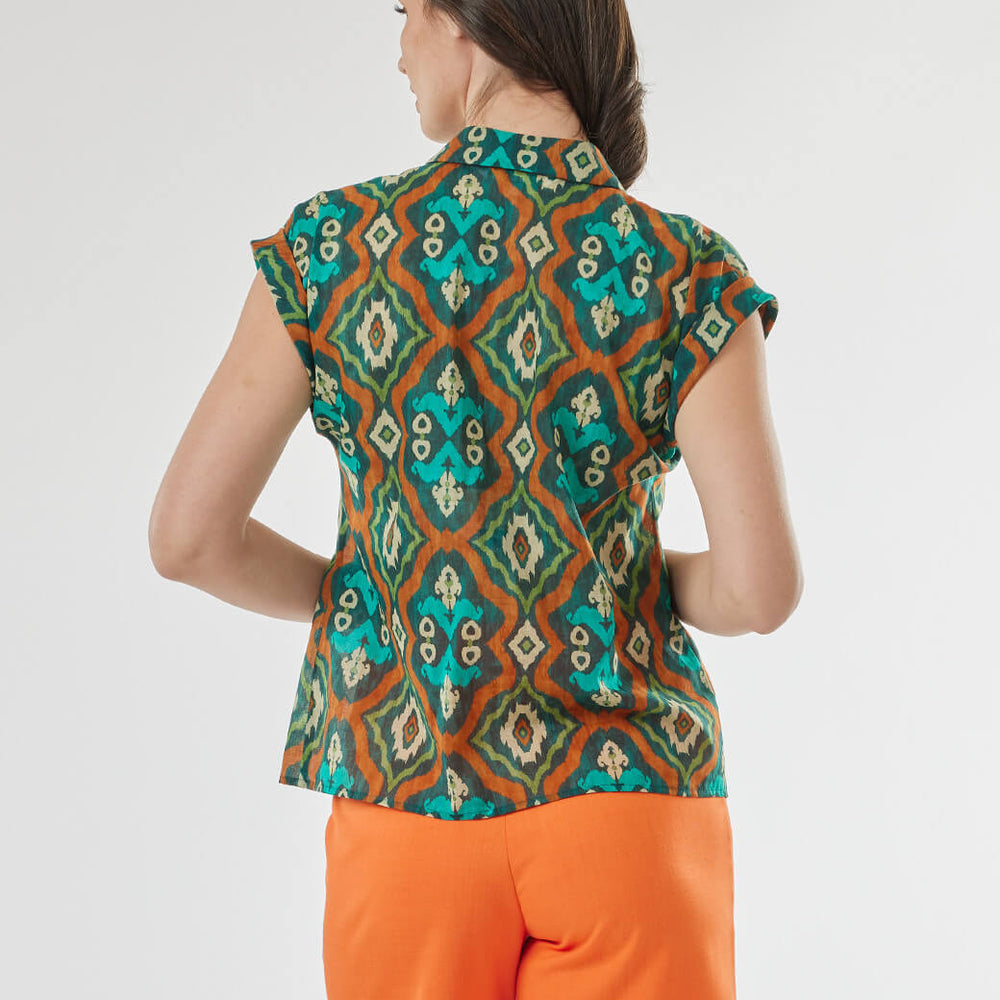 
                      
                        Blusa verde Kalani
                      
                    