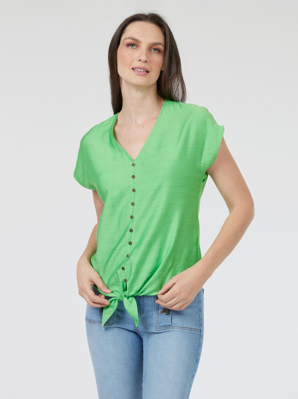 Blusa verde con hombro caído Esenciales