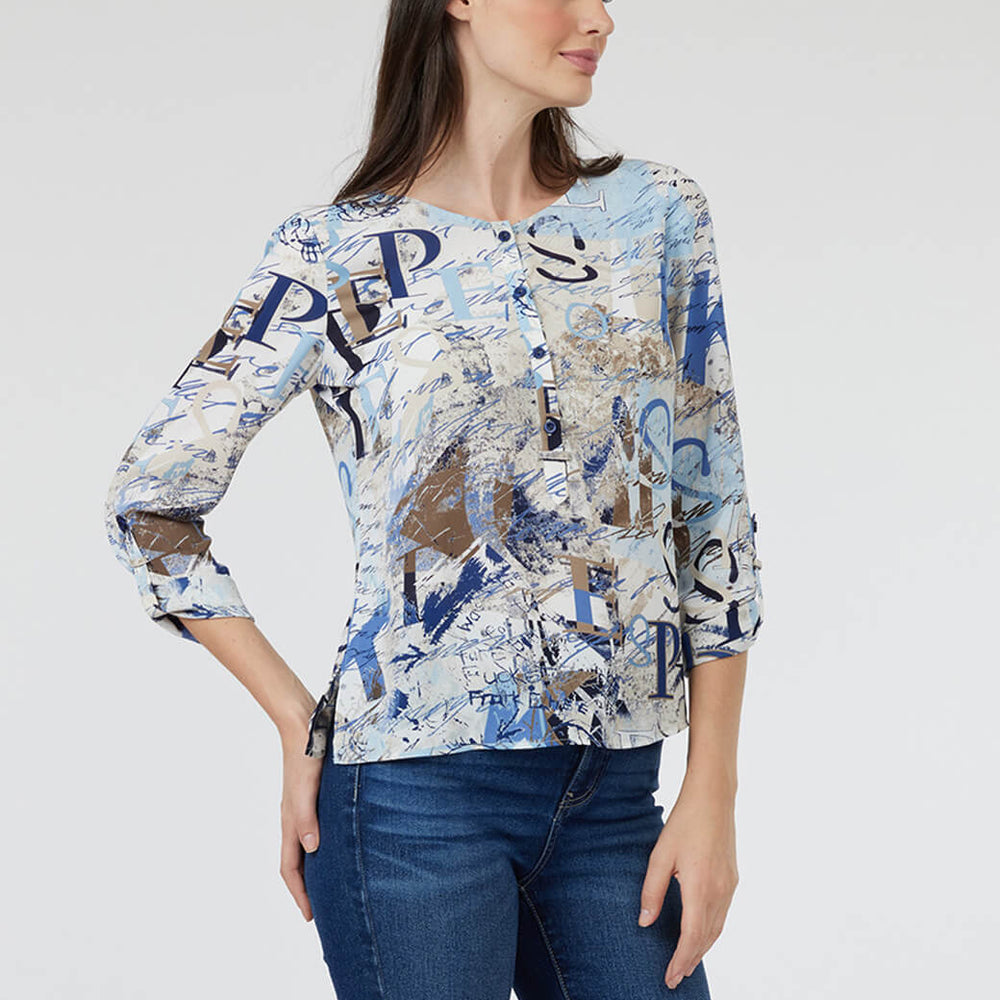 
                      
                        Blusa hueso con escote redondo Esenciales
                      
                    