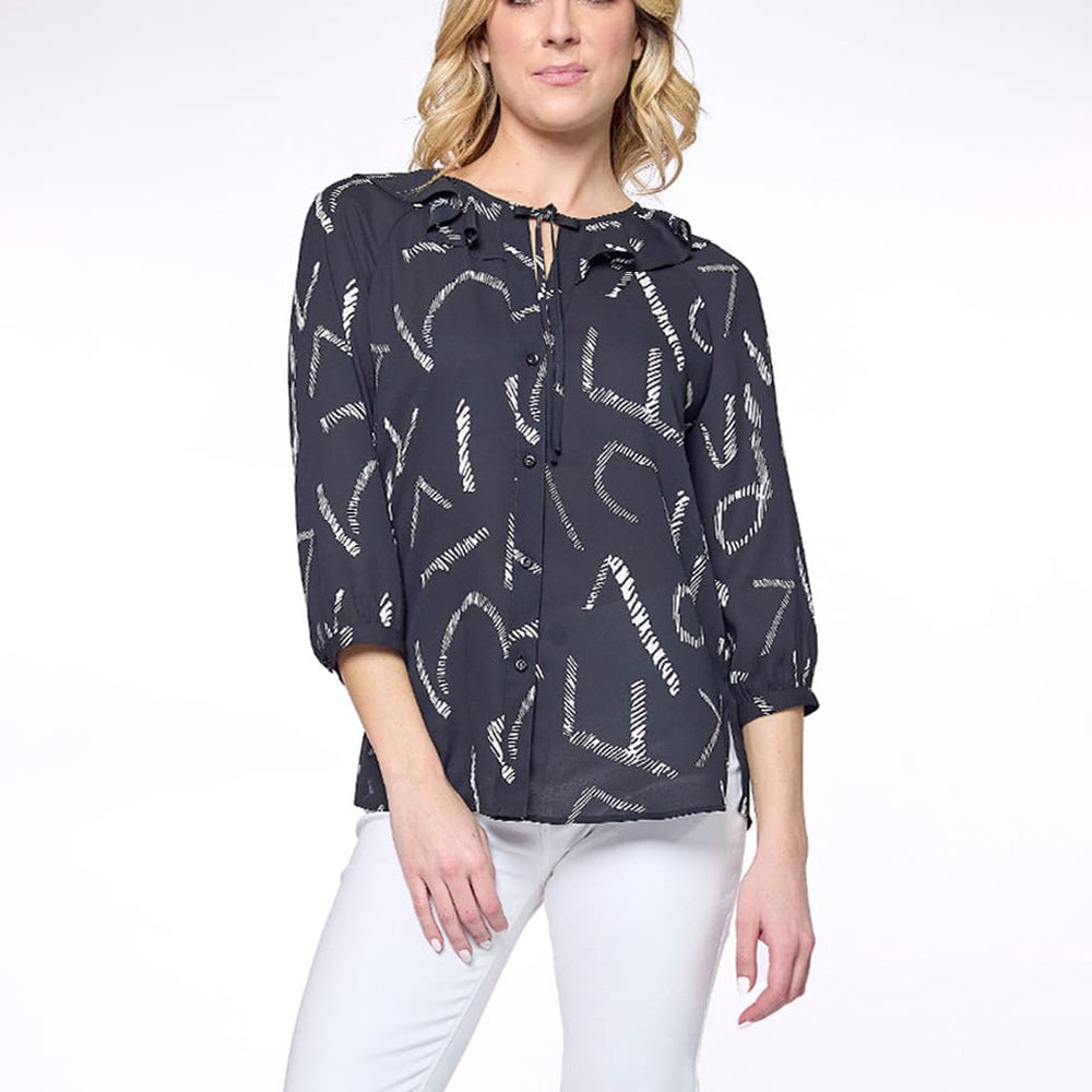 
                      
                        Blusa negro con escarola Esenciales
                      
                    