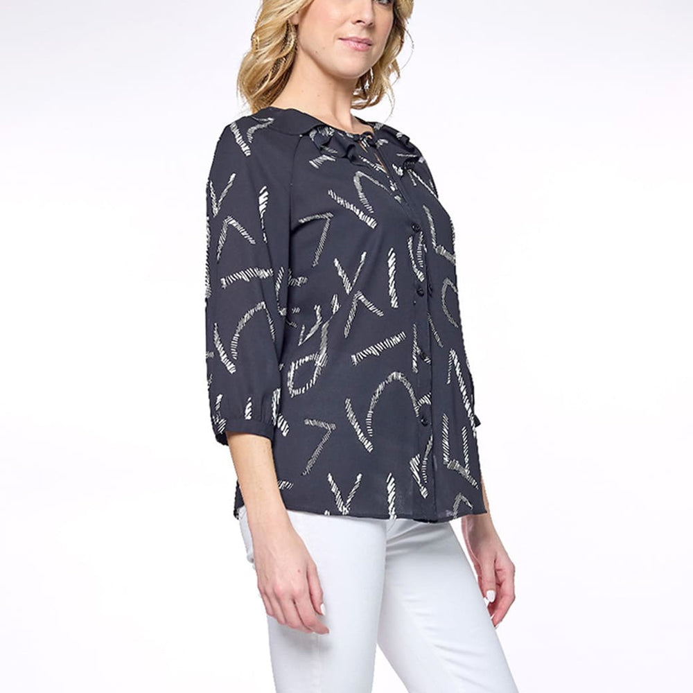 
                      
                        Blusa negro con escarola Esenciales
                      
                    