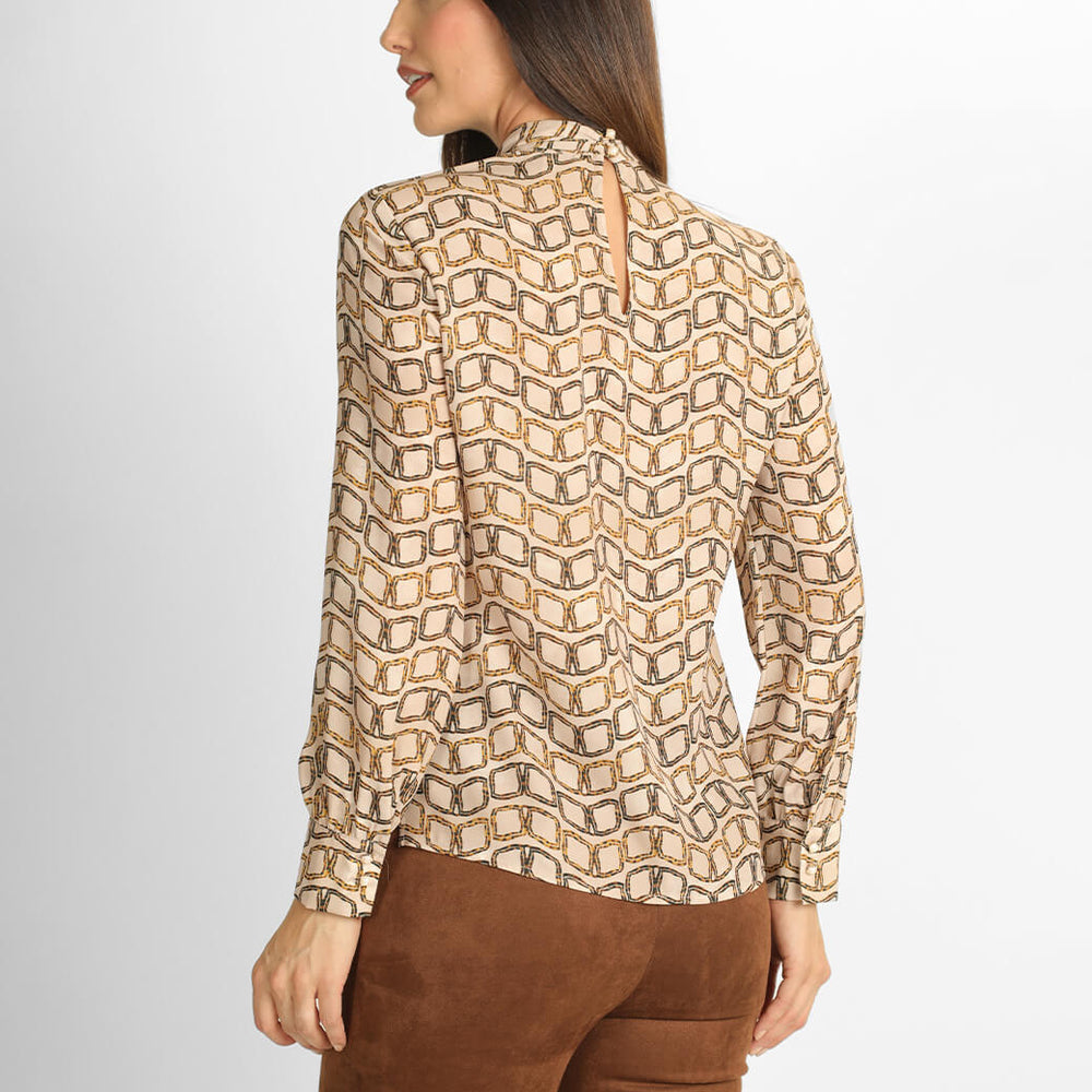 
                      
                        Blusa beige Makela
                      
                    