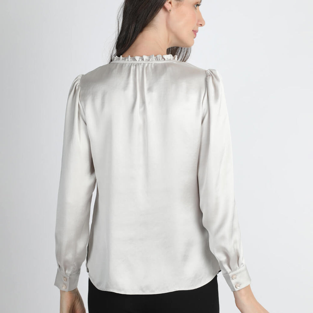 
                      
                        Blusa beige Shayla
                      
                    