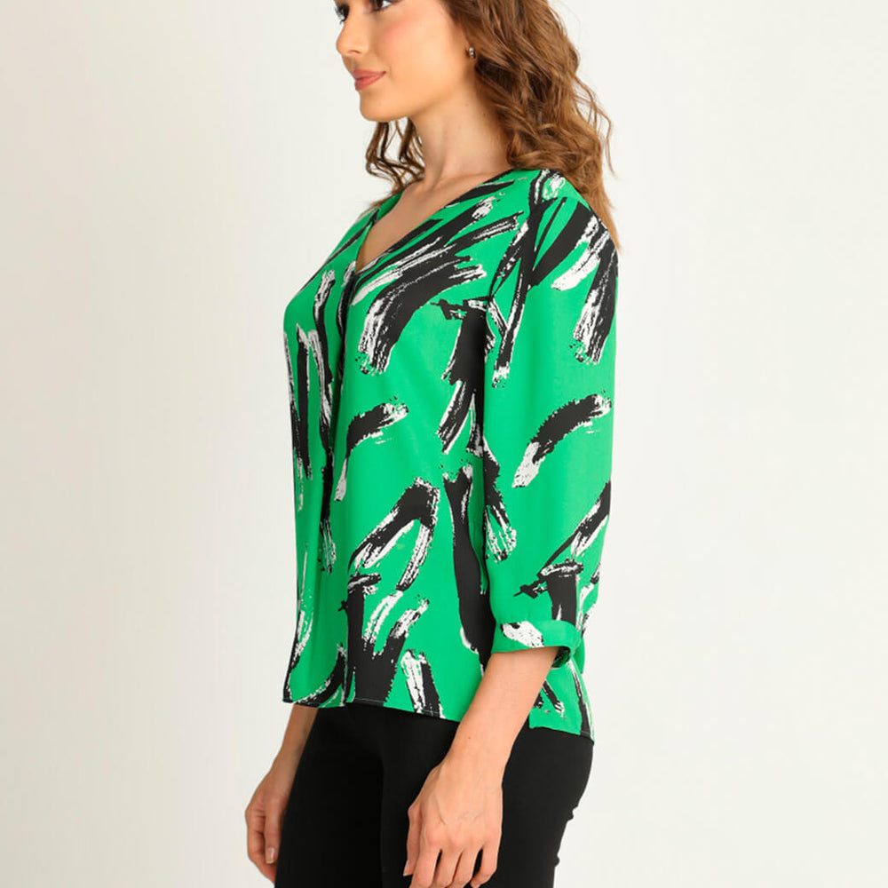 
                      
                        Blusa verde estampada
                      
                    