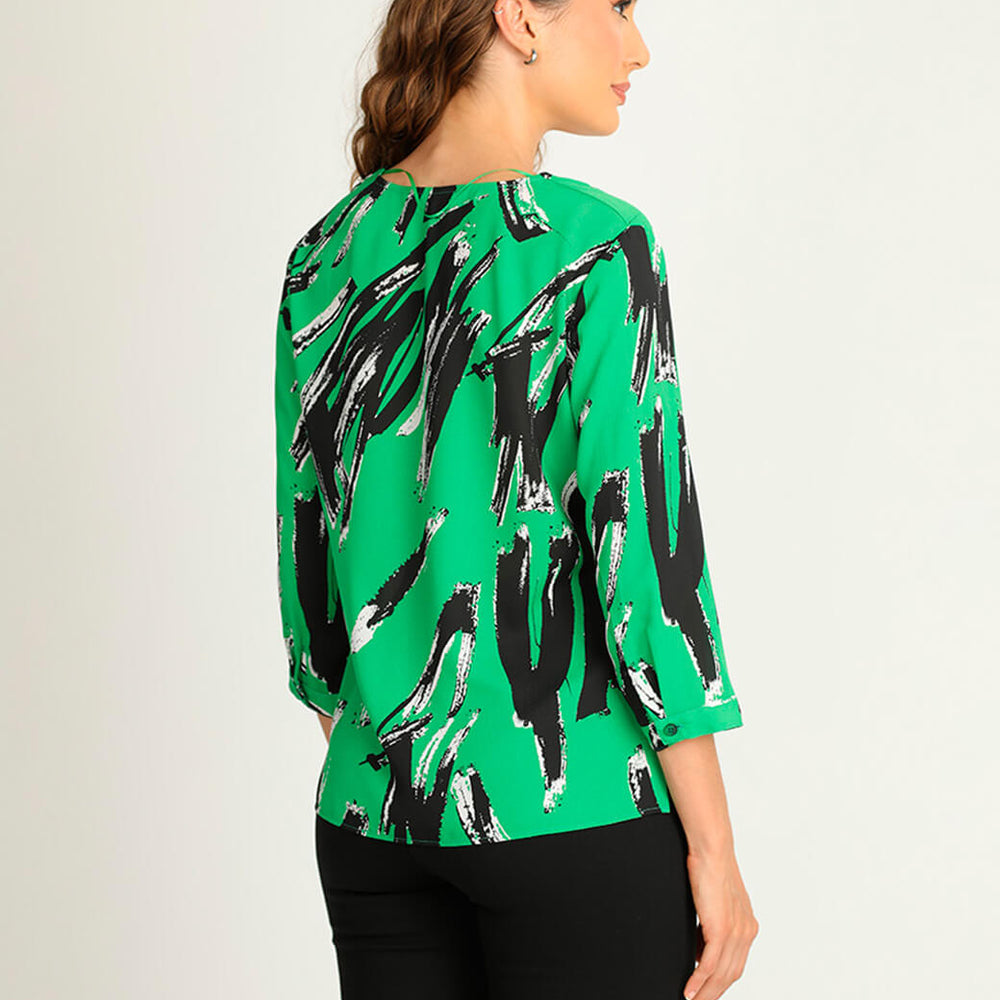 
                      
                        Blusa verde estampada
                      
                    