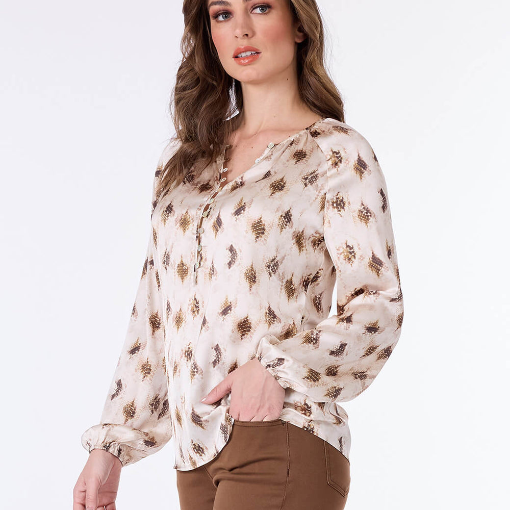 
                      
                        Blusa beige estampada Misha
                      
                    