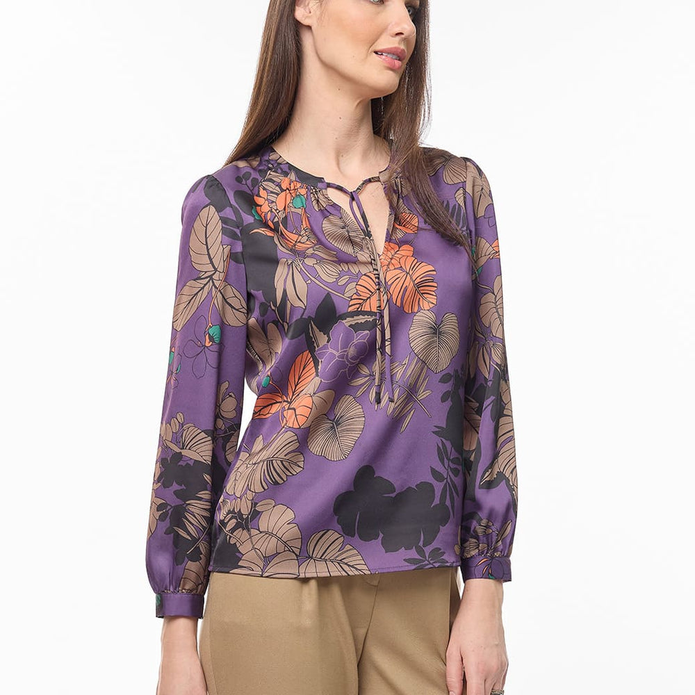 
                      
                        Blusa morada Debra
                      
                    