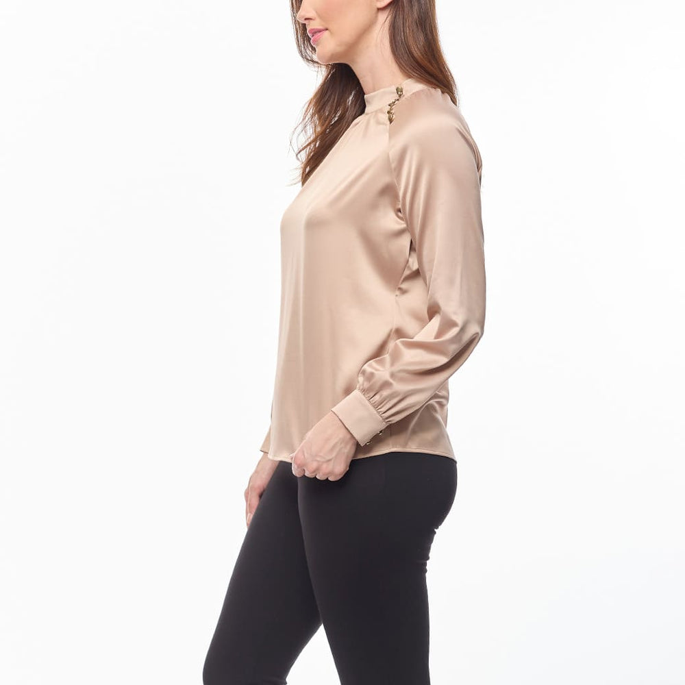 
                      
                        Blusa beige Zana
                      
                    