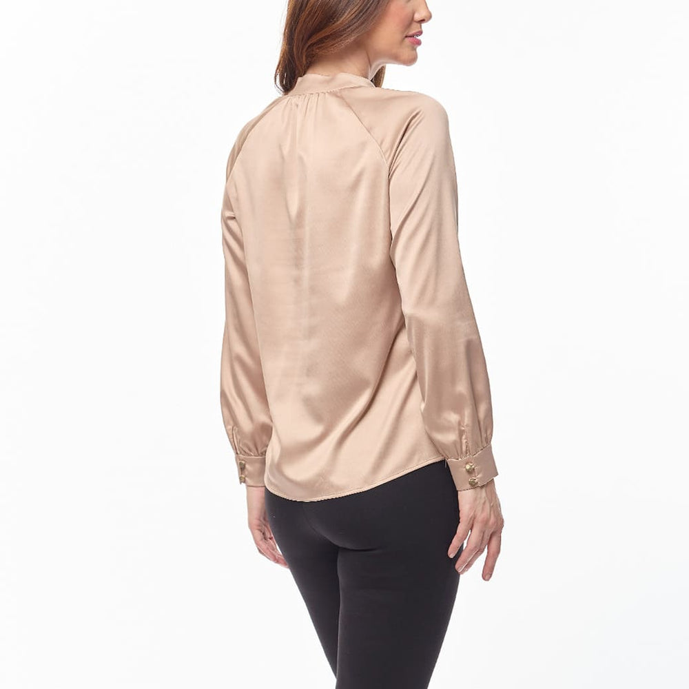 
                      
                        Blusa beige Zana
                      
                    