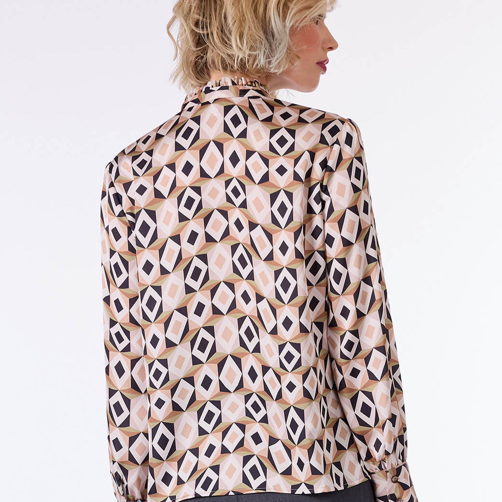 
                      
                        Blusa beige estampada Olinda
                      
                    