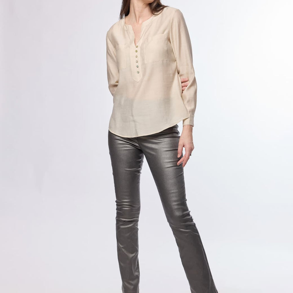 
                      
                        Blusa beige Jamila
                      
                    