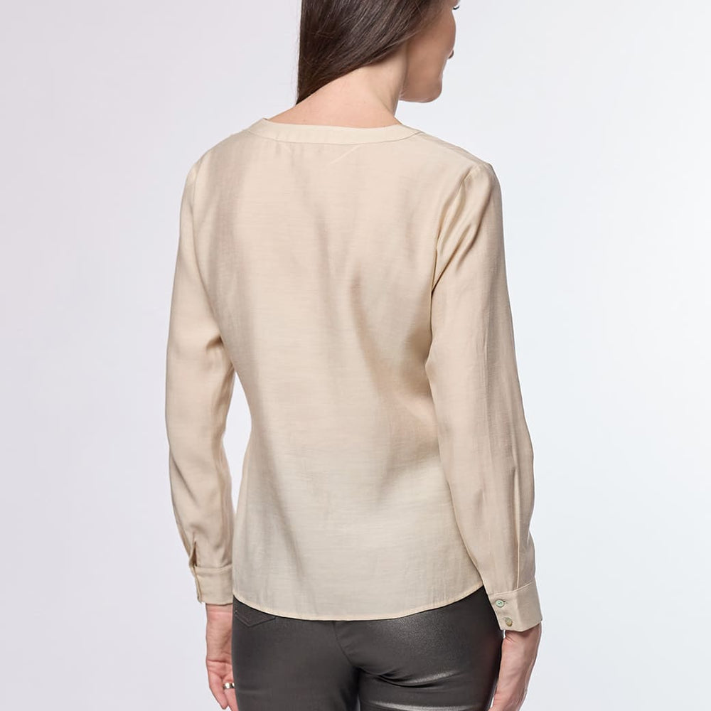 
                      
                        Blusa beige Jamila
                      
                    