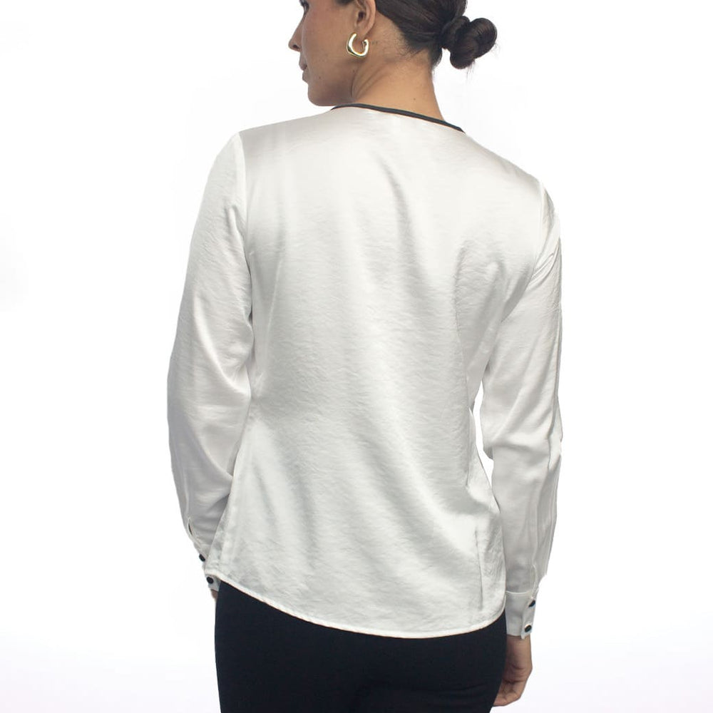 
                      
                        Blusa blanca Paz
                      
                    