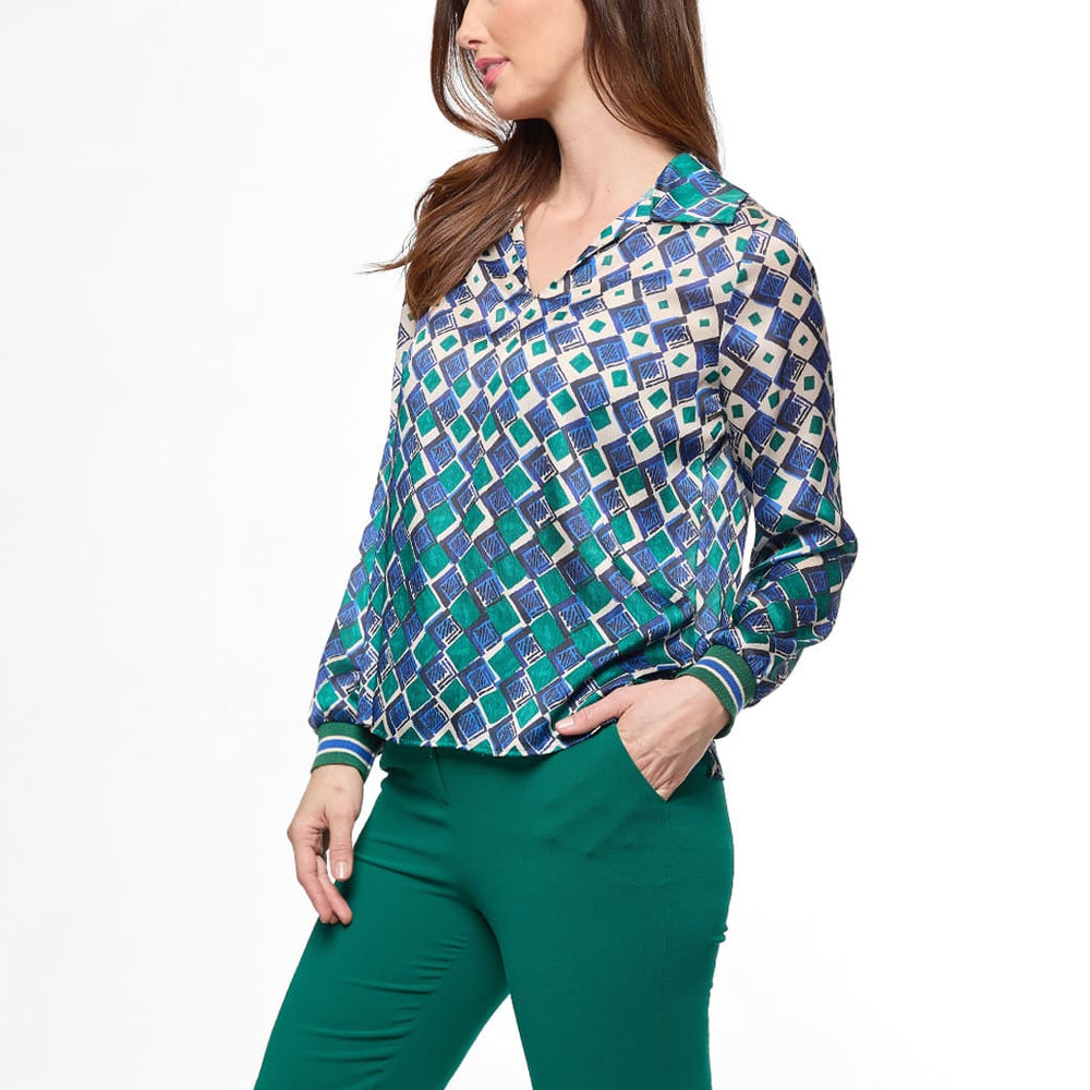 
                      
                        Blusa verde Perla
                      
                    