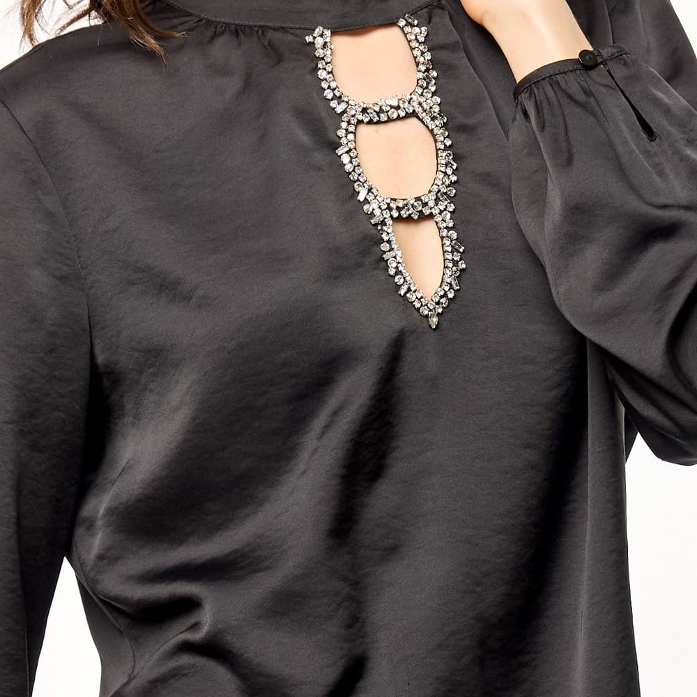 Blusa negra con detalle Leyna