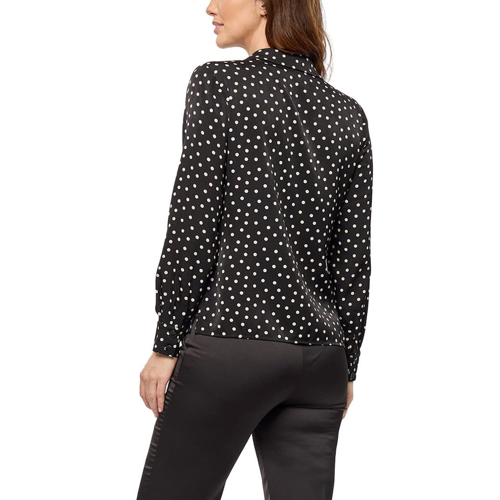 
                      
                        Blusa negra con lunares Naysa
                      
                    