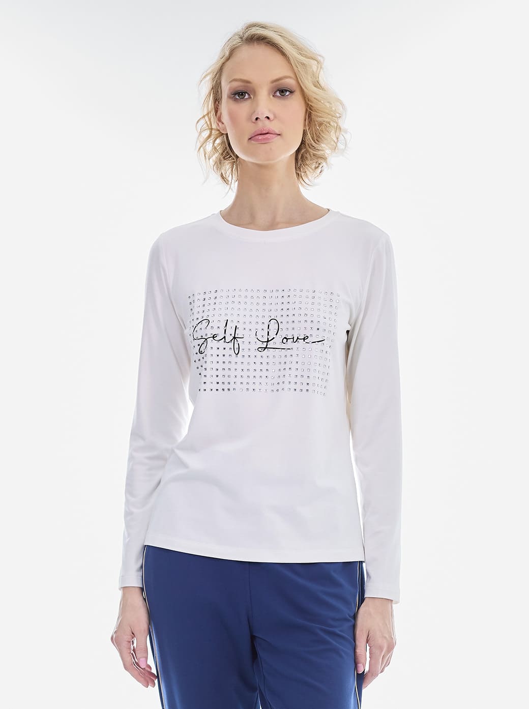 Blusa hueso letras esenciales