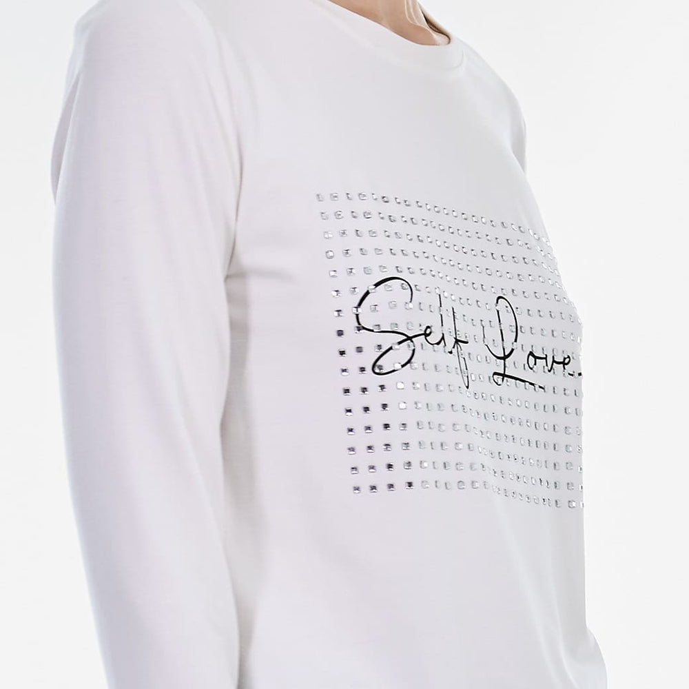 Blusa hueso letras esenciales