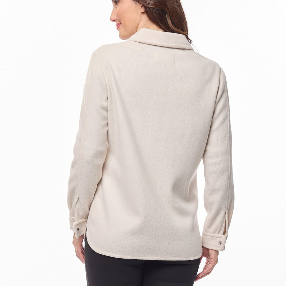 
                      
                        Camisola beige con cuello sport Esenciales
                      
                    