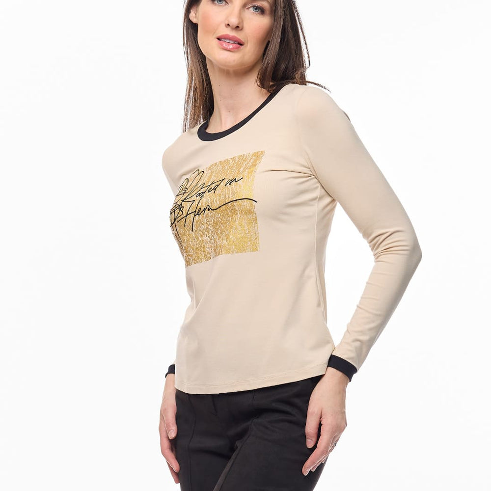 
                      
                        Blusa beige Tiziana
                      
                    