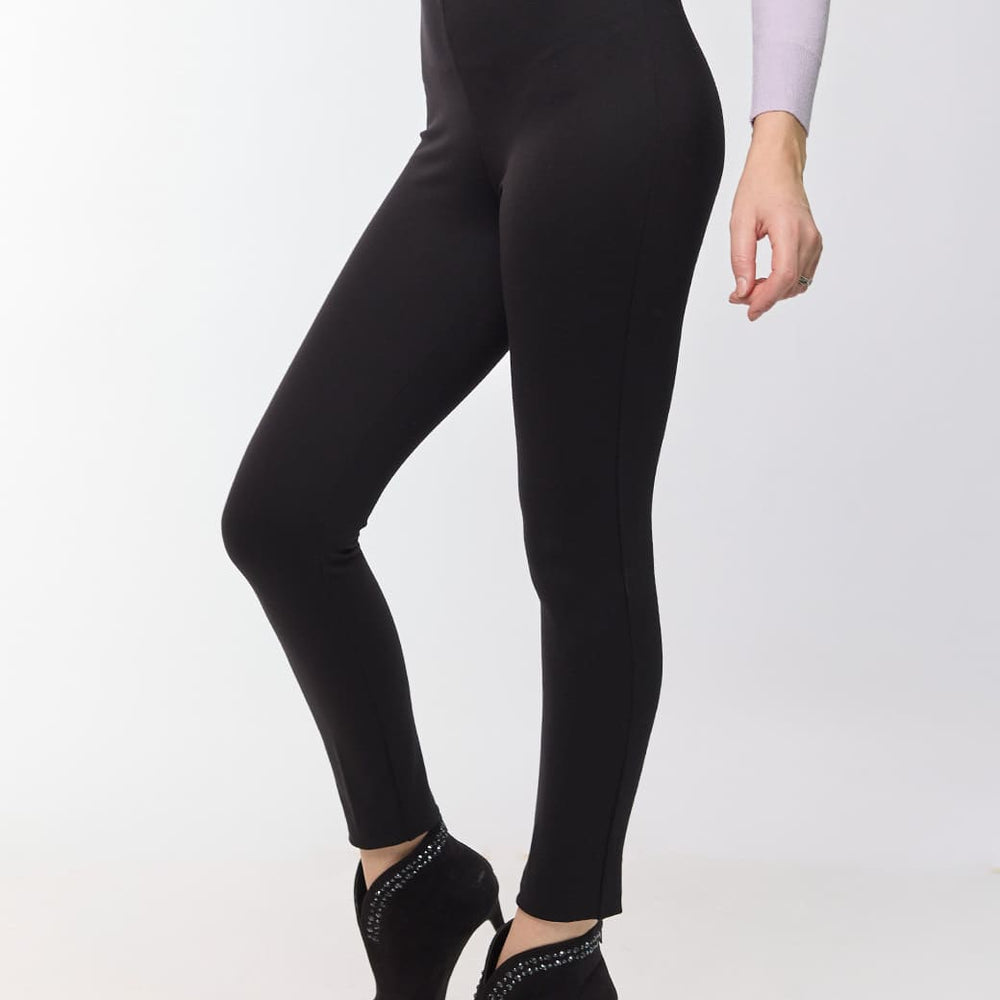 
                      
                        Leggings negros con broche Esenciales
                      
                    