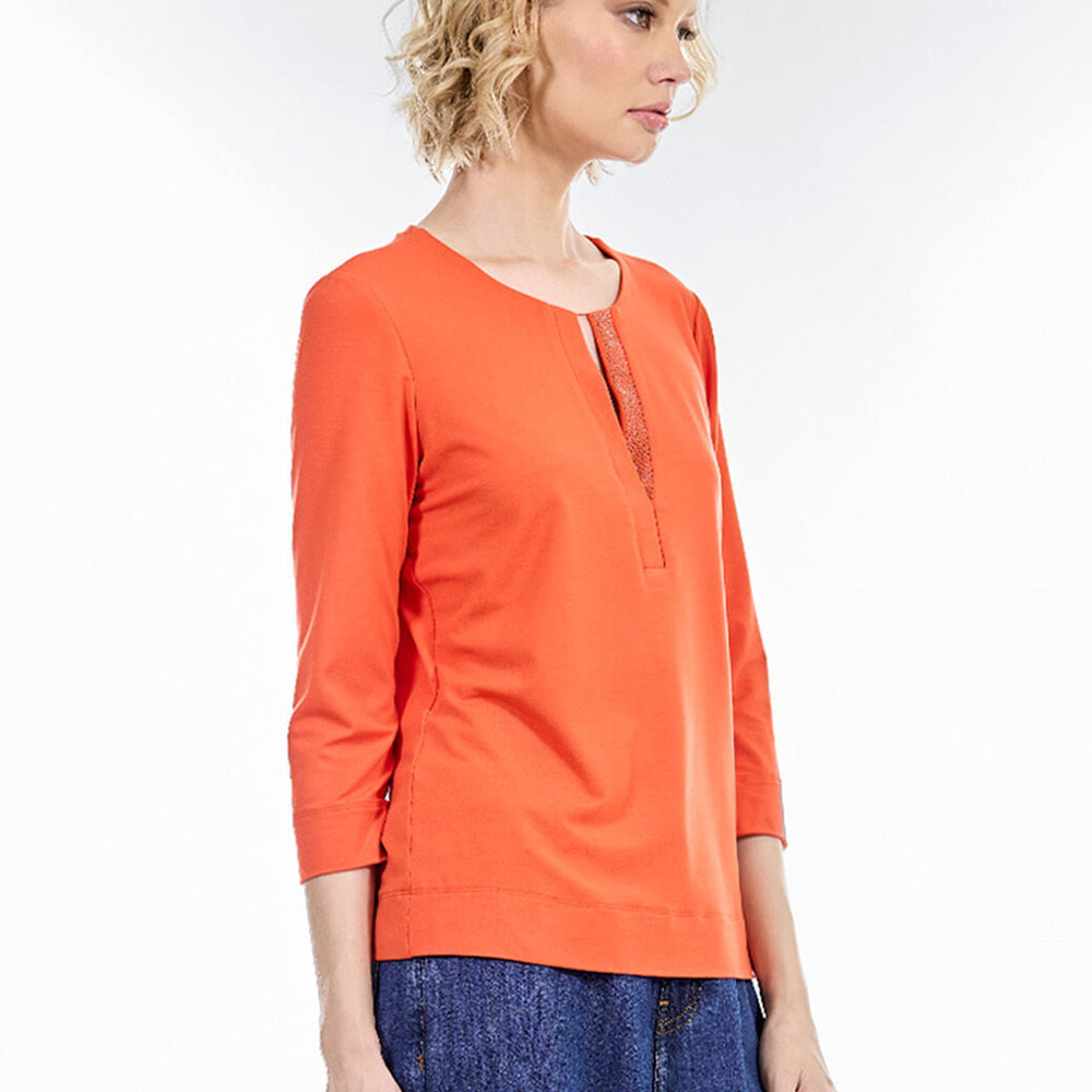 
                      
                        Blusa naranja Básica
                      
                    