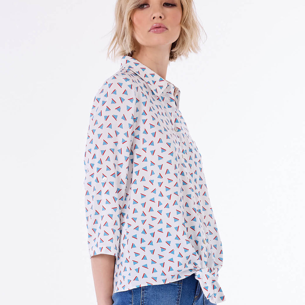 
                      
                        Blusa blanca Aura
                      
                    