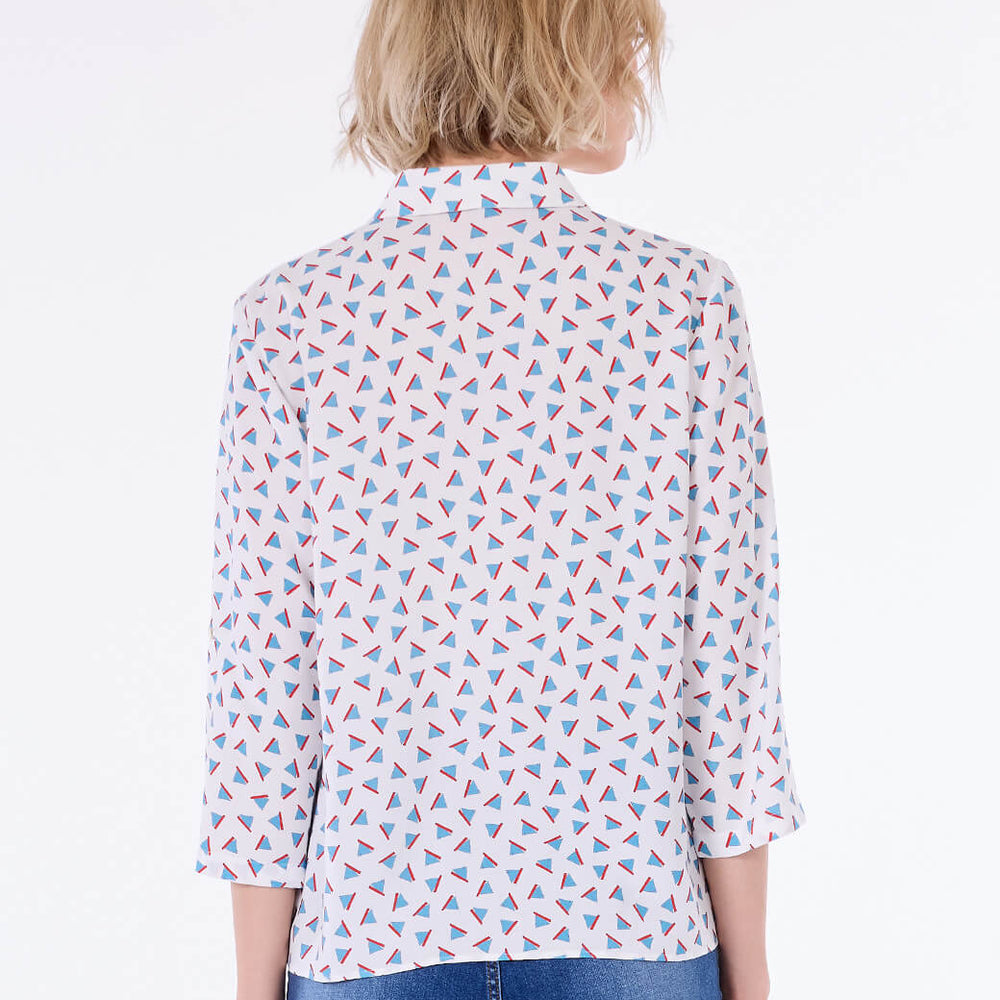 
                      
                        Blusa blanca Aura
                      
                    